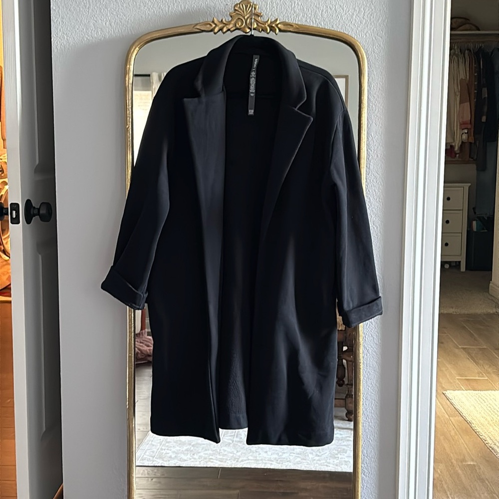 Vuori black jacket. Price firm. Bought for trip and didn’t bring. Like new.